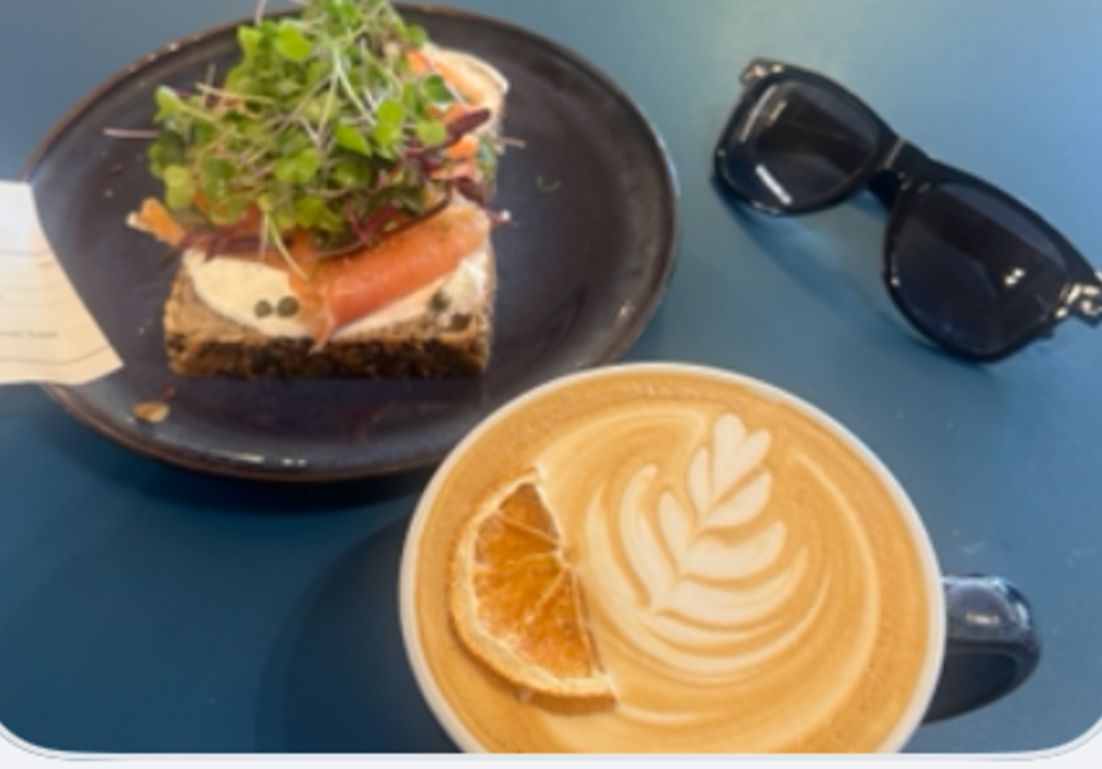 Smoked salmon toast with a latte